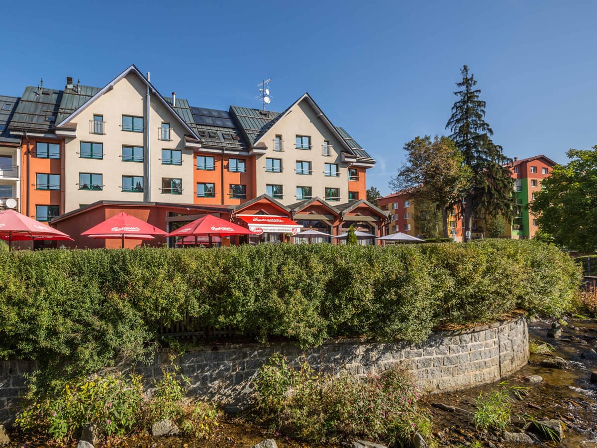 View of the pension building with summer terrace